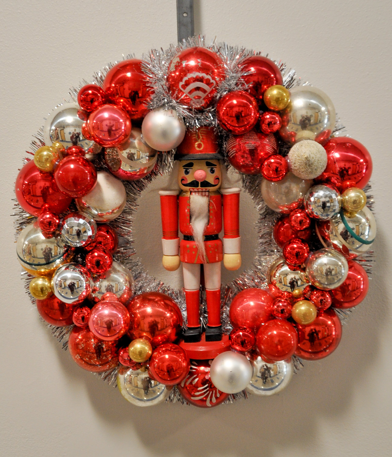 Brandi Merolla's Vintage Ornament Wreaths Show at the Narrowburg Union iscomprised of Shiny-Brite balls, old fashioned Santas and snowman ornaments.